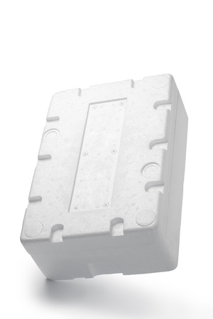 Styrofoam box isolated on wood backgroundの写真素材
