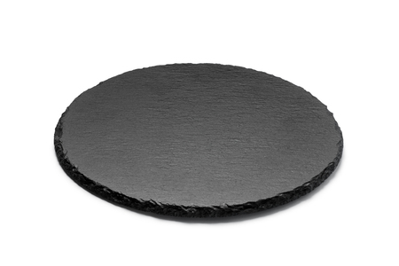 Round stone plate isolated on white backgroundの写真素材