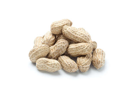 Pile of peanuts isolated on white backgroundの写真素材