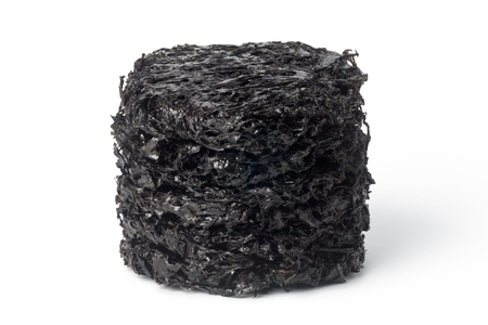 Pile of Chinese dried laver isolated on white backgroundの写真素材