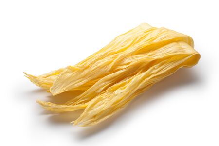 Chinese Yuba (dried beancurd sticks) isolated on white backgroundの写真素材