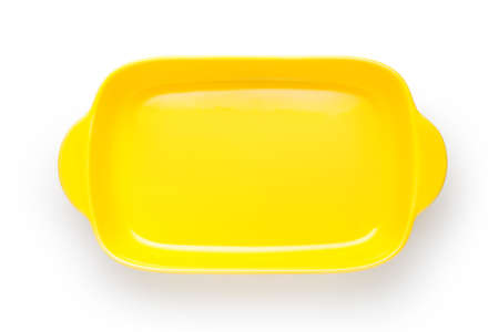Empty yellow bowl isolated on white background, Top view.の写真素材