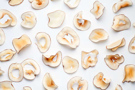 Sliced of sea coconut on white background. Materials for soup making. Food background.の写真素材