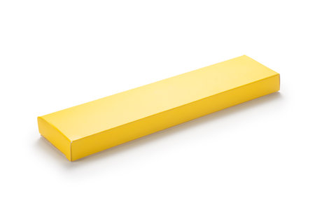 Yellow paper box isolated on white backgroundの写真素材