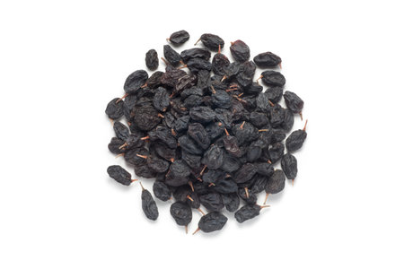 Black currant raisins isolated on white background. Top view.の写真素材