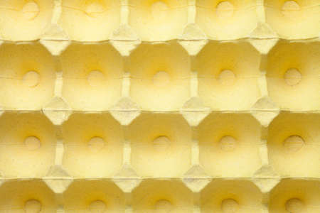 Background of empty egg tray. Close-up.