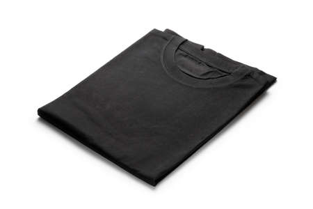 Black folded t-shirt isolated on white background.の写真素材