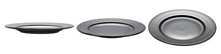 Empty black plate isolated on white background.の写真素材