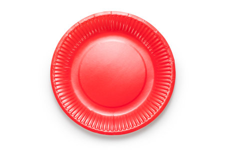 Top view of red paper plate isolated on white backgroundの写真素材
