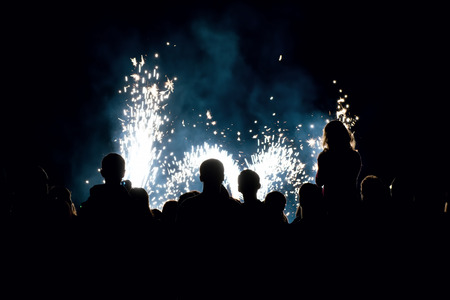 Image of a people in front of a fireworksの写真素材