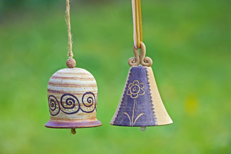 Ceramic bells  in gardenの写真素材