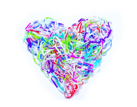 a colorful heart made of a lot of plastic bands