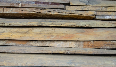 close up of old wood, piling up - background