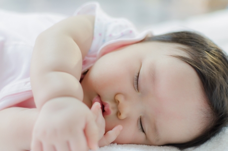 close up of asian baby girl sleepingの写真素材