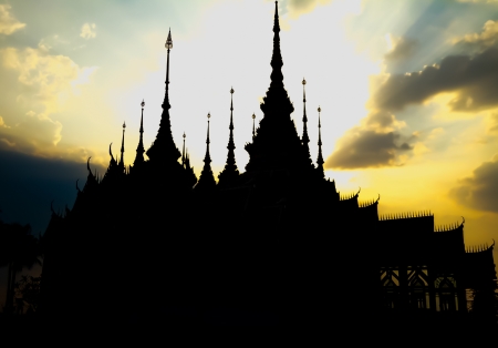 Thai palace Silhouette with yellow sky backgroundのeditorial素材