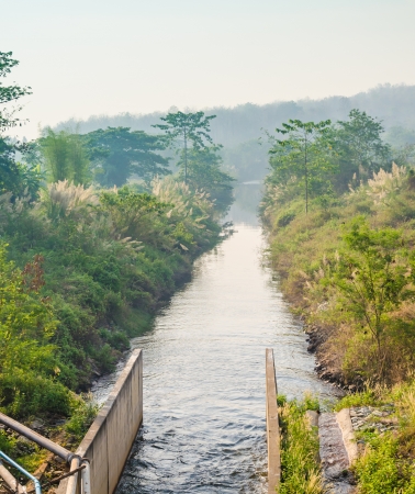 a canal in countryside for agricultureの写真素材