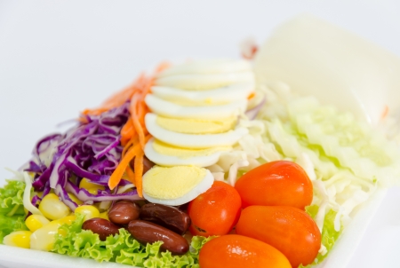 fresh vegetables salad with slied eggs in packaging for take homeの写真素材