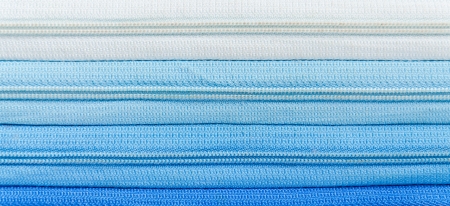 zipper blue gradient background closeup