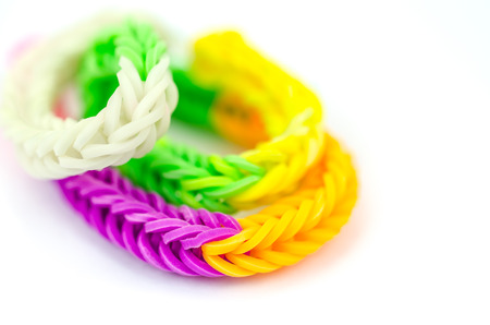 rubber bands with colorful fashion bracelet on white backgroundの写真素材