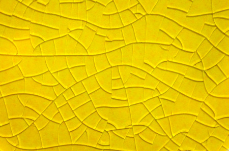 cracked glazed tile texture backgroundの写真素材