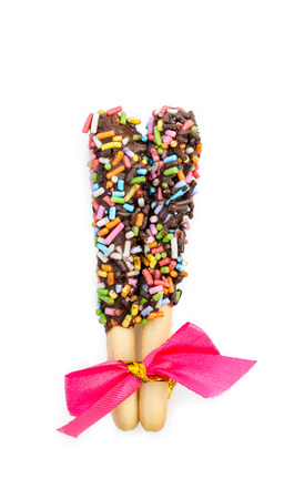 crispy sweet straw covered chocolate with colorful sugar sprinkles - close upの写真素材