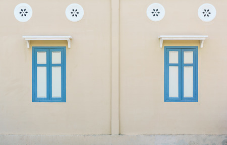 vintage windows on the wall for backgroundの写真素材