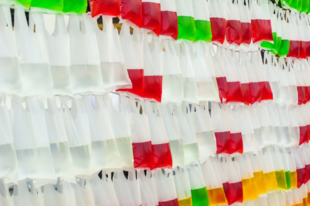 Color water in the translucent plastic bags - Abstract background.の写真素材