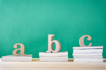 Concept of education or back to school on green background
