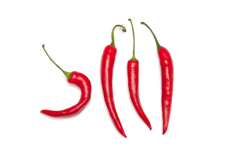 Hook shape chili pepper on white backgroundの写真素材
