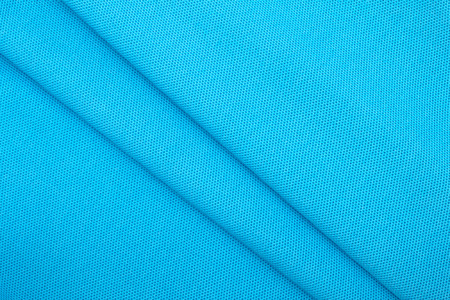 Background of wavy blue cotton fabricの写真素材