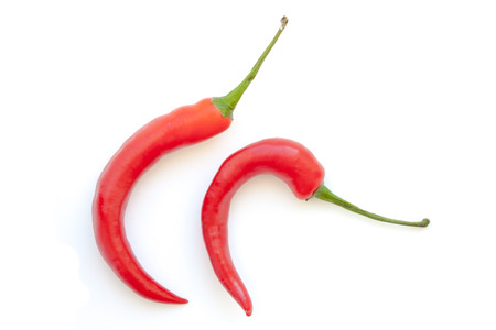 Hook shape chili pepper on white backgroundの写真素材