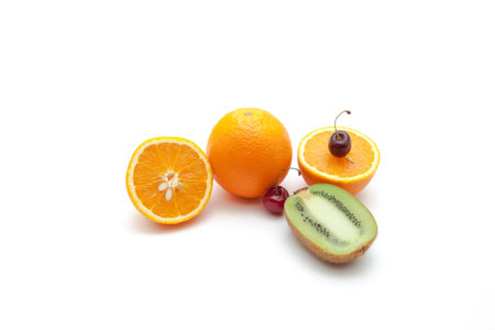 Tropical fruits and cherry isolated on white backgroundの写真素材