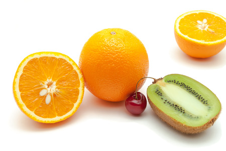Tropical fruits and cherry isolated on white backgroundの写真素材