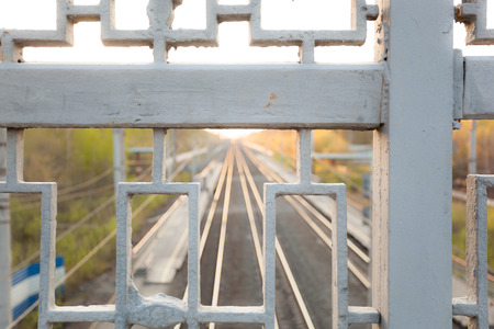 Railroad going over the horizon. Out of focus.の写真素材