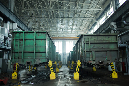 porpus cars raised on stilts. repair plant