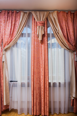 interior room. curtains. drapes. bedroom. very cozyの写真素材