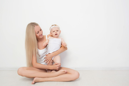 mother with her baby studio shot