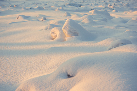 landscape. weather, snowdrifts in the foregroundの写真素材