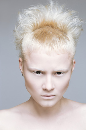 angry aggressive girl in black lenses.の写真素材