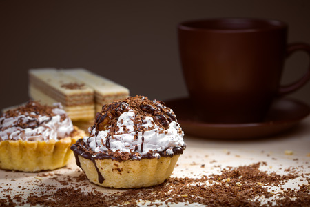 Cup of coffee and Cake on a table
