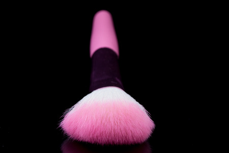 Closeup of makeup brush and blushの写真素材