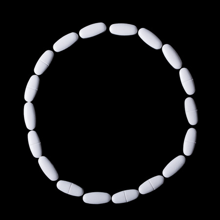 round of white oblong tabletsの写真素材