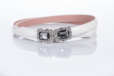 thin white female belt buckle with fineの写真素材