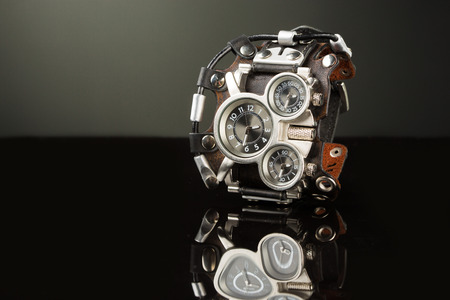 unusual watches. several alternatives dials. wide leather bracelet