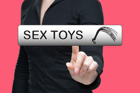 Sex Toys word on virtual screen push by business woman. online store of the intimate goods conceptの写真素材