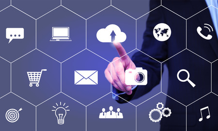 businessman clicks on cloud icon on the virtual screen. Business, technology, internet and...