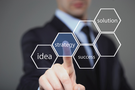 Businessman pressing button on touch screen interface and select strategy. Business,  technology concept.の写真素材