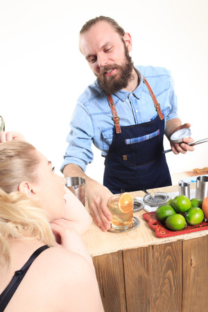 drunk girl clings to the bartenders. Isolated on white backgroundの写真素材