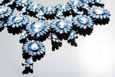 necklace on gray background. large gems. close-upの写真素材