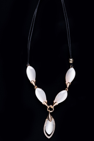 necklace on a black background. gems. bijouterieの写真素材
